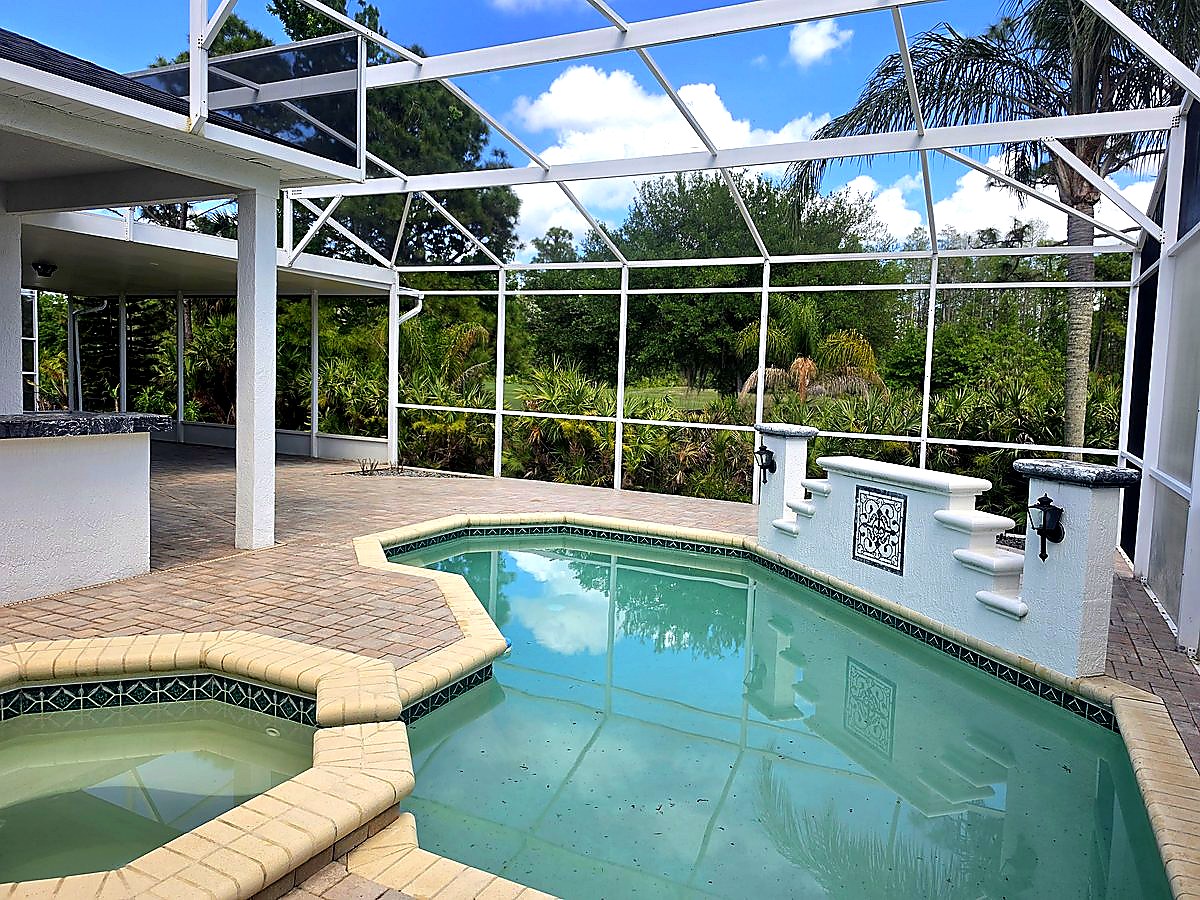 Restored pool deck after gutter cleaning service in Orlando